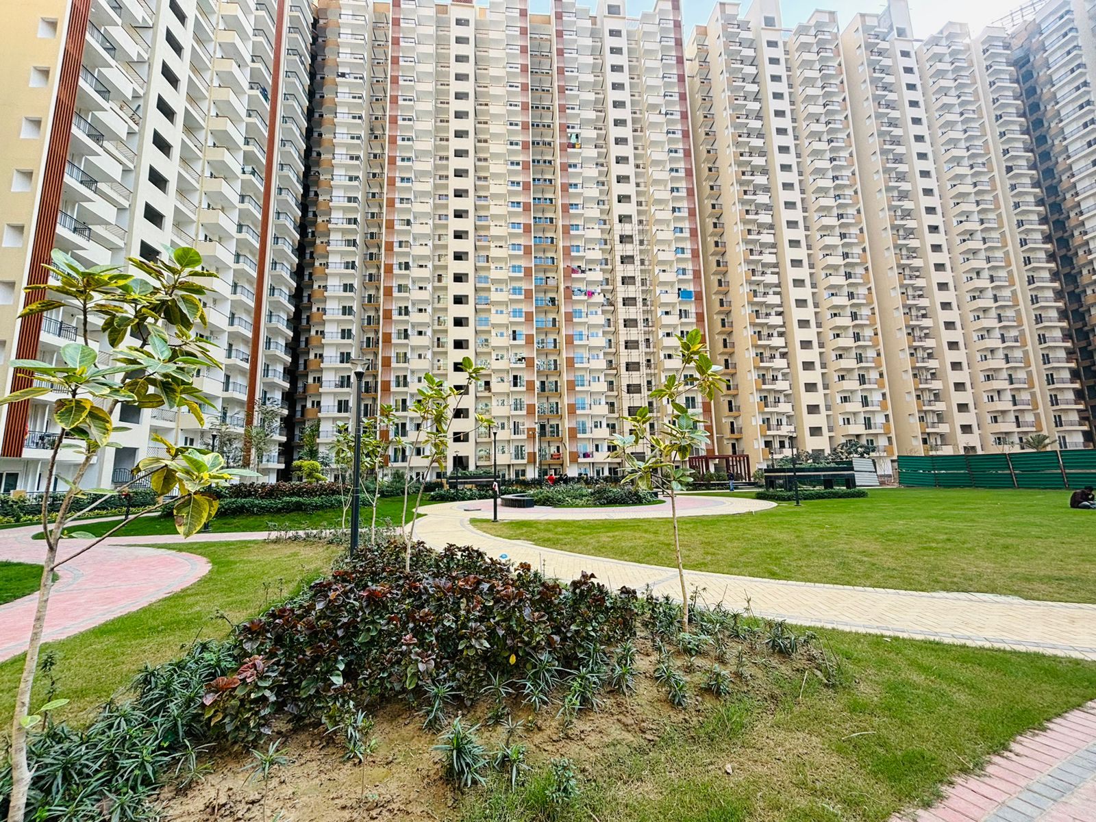 Central lawn between Nirala Estate apartment towers